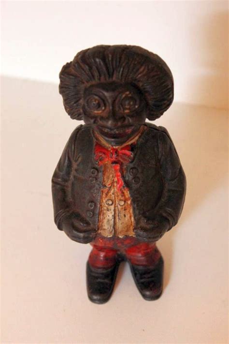 metal golliwog money box|Cast iron (old/antique) Golliwog Moneybox / Piggy .